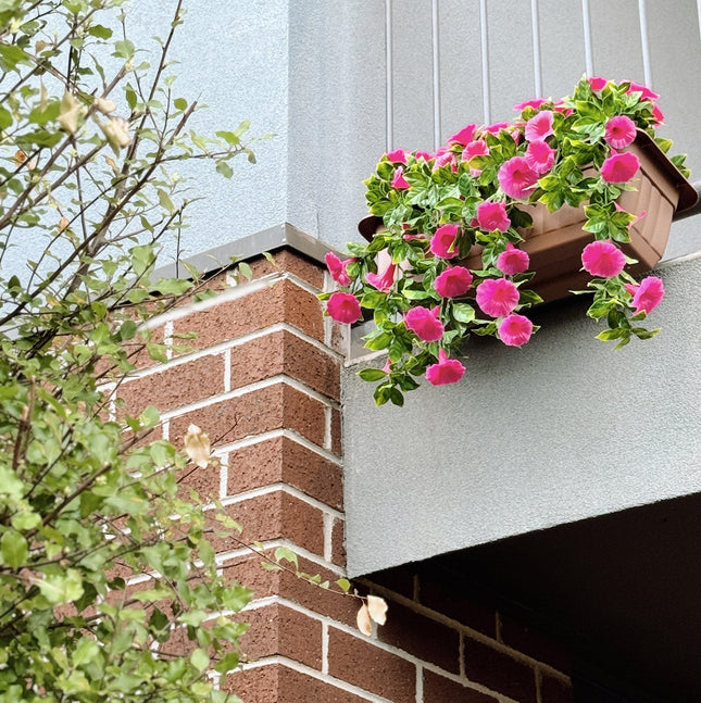 Artificial Petunia (Morning Glory) planters hanging on balcony