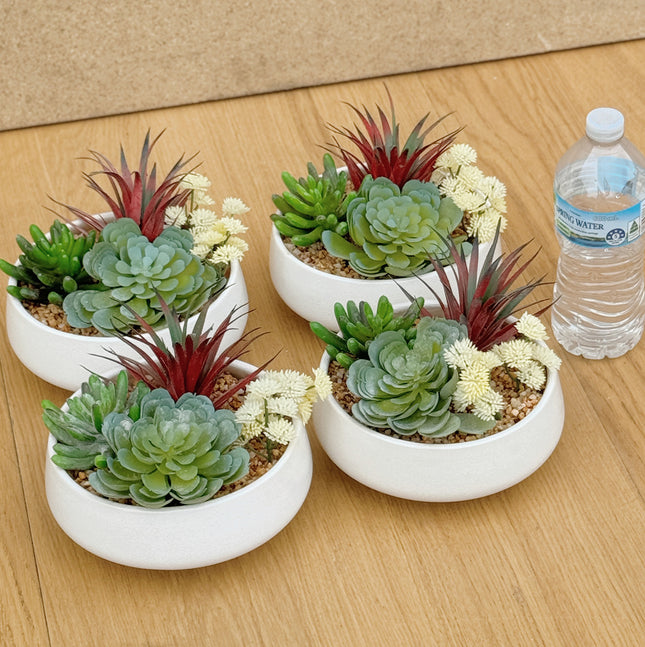 4 pots of artificial succulents